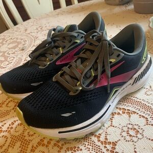 This is a Brooks Adrenaline GTS 23 running shoe in the Black/Gun Metal/Sharp .